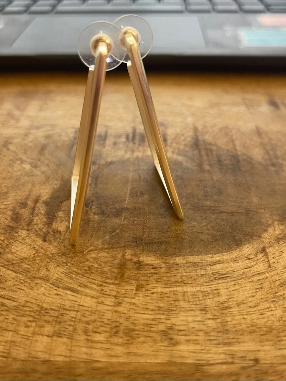 Kendra Scott gold tone geometric hoop style earrings